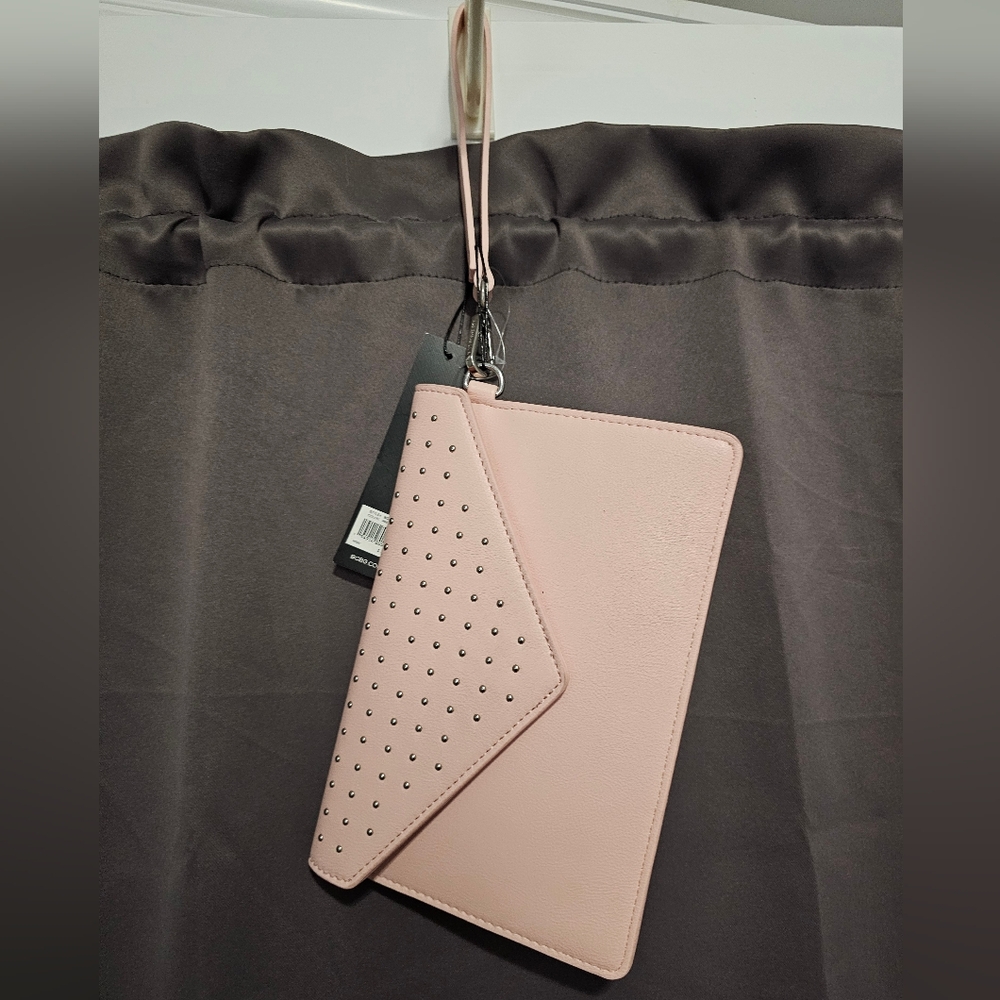 BCBG pink envelope wristlet.